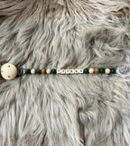 Metsänvihreä tuttinauha