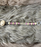 Vaaleanpunainen tuttinauha