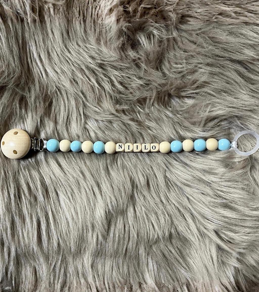 Vaaleansininen tuttinauha