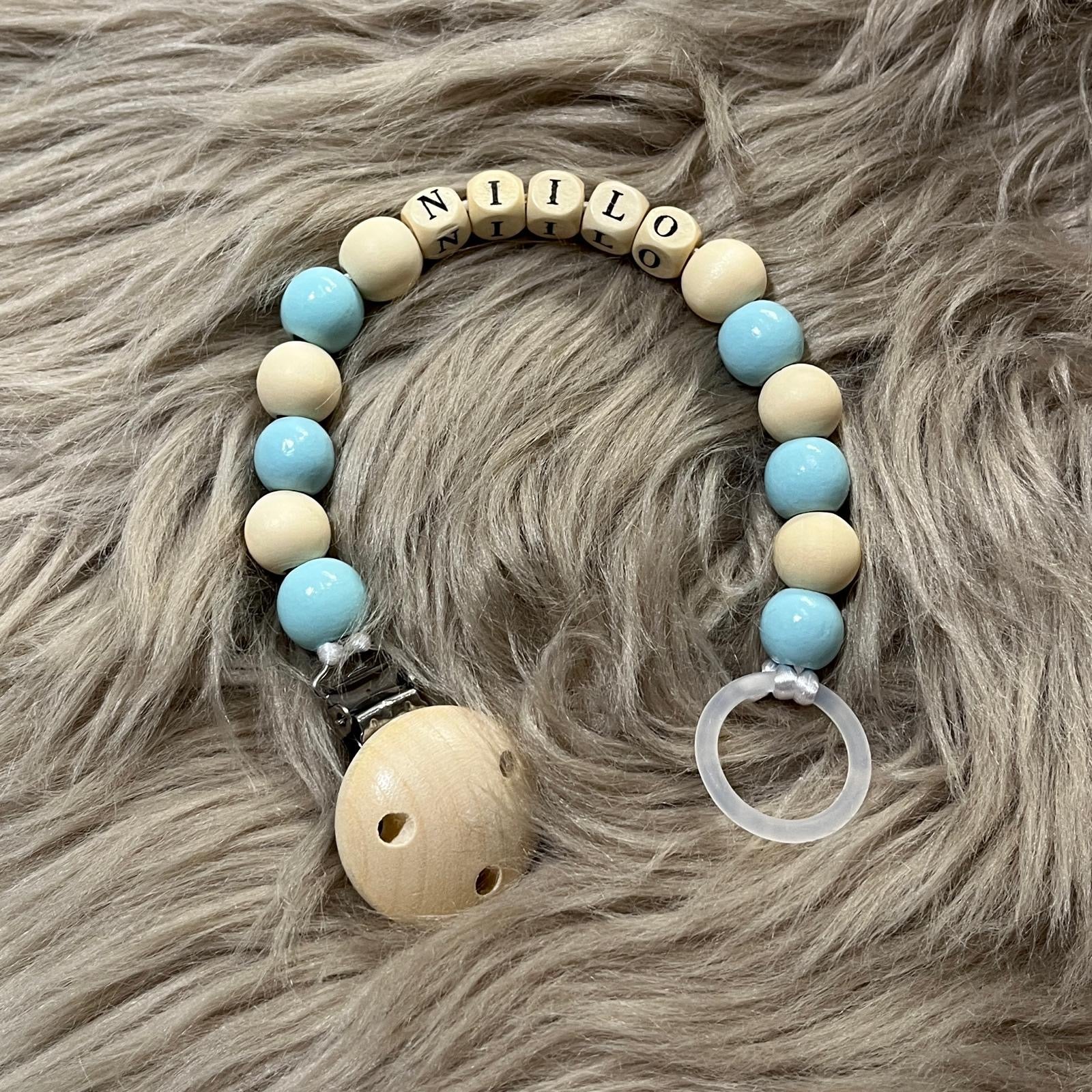 Vaaleansininen tuttinauha